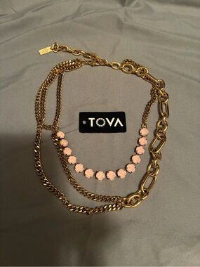 TOVA CRICKET Gold Multi-Chain Necklace with Pink Crystal Accents